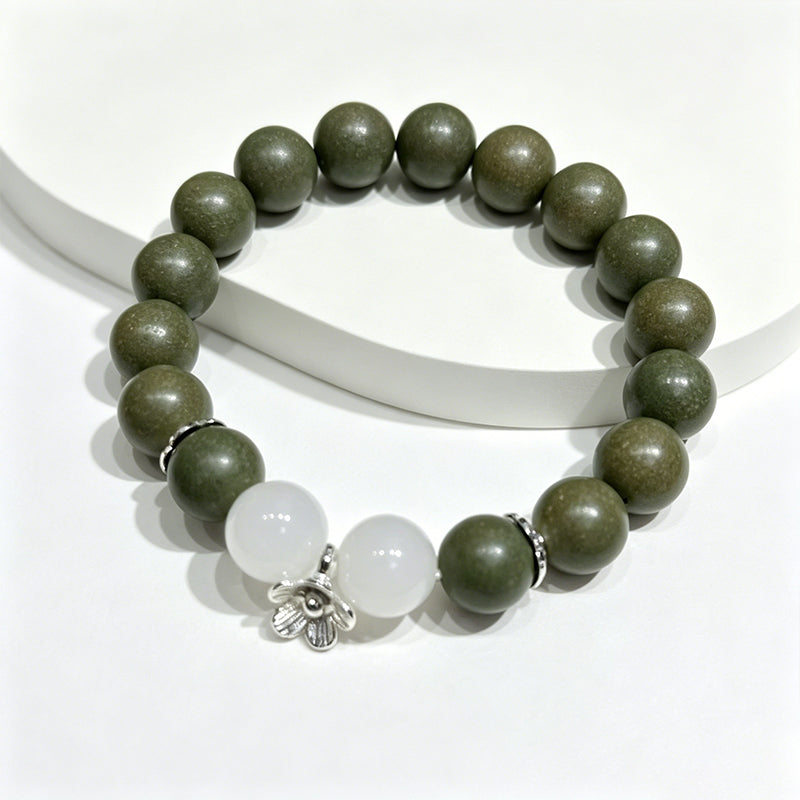 Wutong Warm R-B41丨Warm Spicy Woody Teal Aroma Wrist Beads White Jade Moonstone Detail