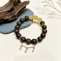 Han Palace Skin Scent R-B49 丨Dark Brown Plant Aroma Wrist Beads with Clear Yellow Crystal & Star Metal Charms