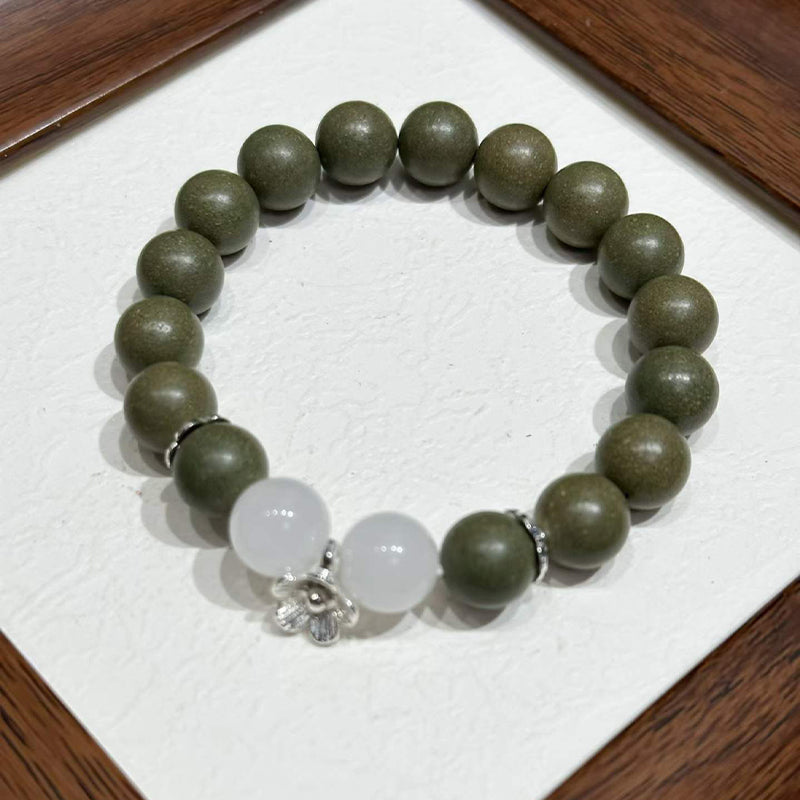 Wutong Warm R-B41丨Warm Spicy Woody Teal Aroma Wrist Beads White Jade Moonstone Detail