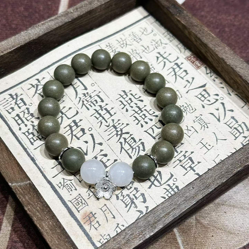 Wutong Warm R-B41丨Warm Spicy Woody Teal Aroma Wrist Beads White Jade Moonstone Detail