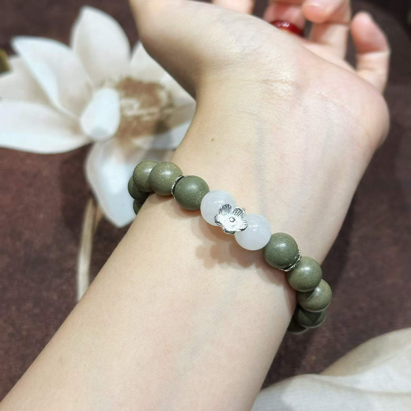 Wutong Warm R-B41丨Warm Spicy Woody Teal Aroma Wrist Beads White Jade Moonstone Detail