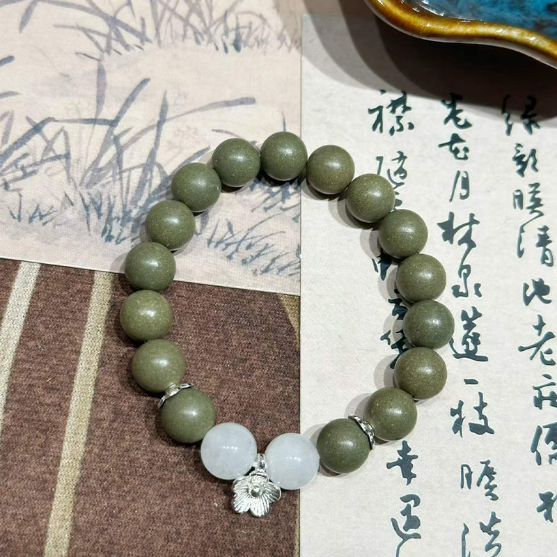Wutong Warm R-B41丨Warm Spicy Woody Teal Aroma Wrist Beads White Jade Moonstone Detail