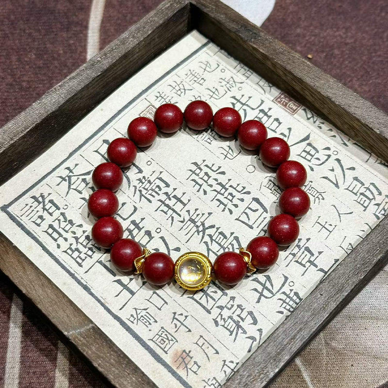 Handcrafted Reconstructed Cinnabar Scented Wrist Strand R-B60 Mild Botanical Aroma with Gilded Rotating Spacer Bead