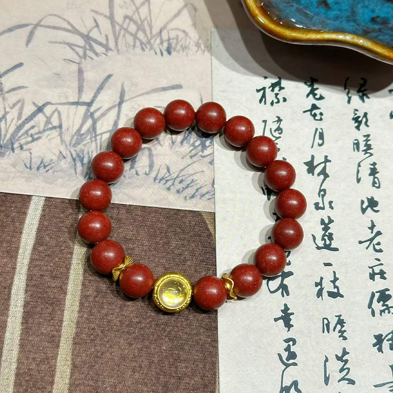 Handcrafted Reconstructed Cinnabar Scented Wrist Strand R-B60 Mild Botanical Aroma with Gilded Rotating Spacer Bead