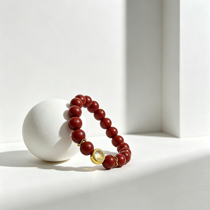 Handcrafted Reconstructed Cinnabar Scented Wrist Strand R-B60 Mild Botanical Aroma with Gilded Rotating Spacer Bead